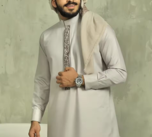 Light Beige Muslim Men's Thobe with Intricate Embroidery Stylish Keffiyeh Ghutra Pairing Modern Traditional Attire for Events